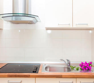 How to choose the right hood for the kitchen by power?