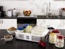 Yogurt maker with the function of preparing cottage cheese, sour cream, cheese, kefir