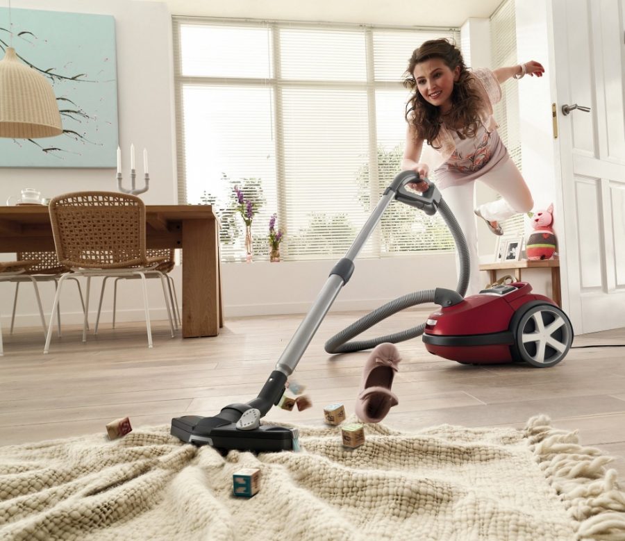 woman with a vacuum cleaner