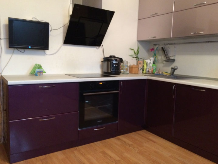 TV on the kitchen wall